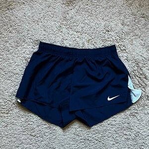 Nike navy blue and white running shorts